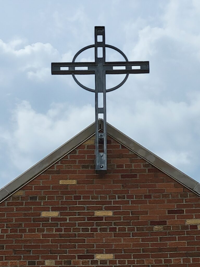 A cross on the top of St. Maximilian Kholbe Church